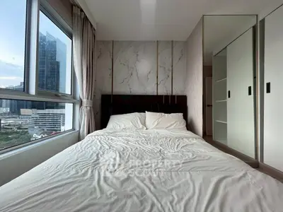 Modern bedroom with city view and sleek design
