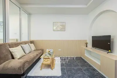 Cozy living room with modern decor and comfortable seating