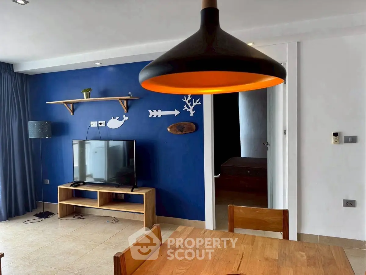 Modern living room with stylish decor and wooden furniture