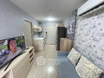 Modern compact living room with open kitchen and stylish decor