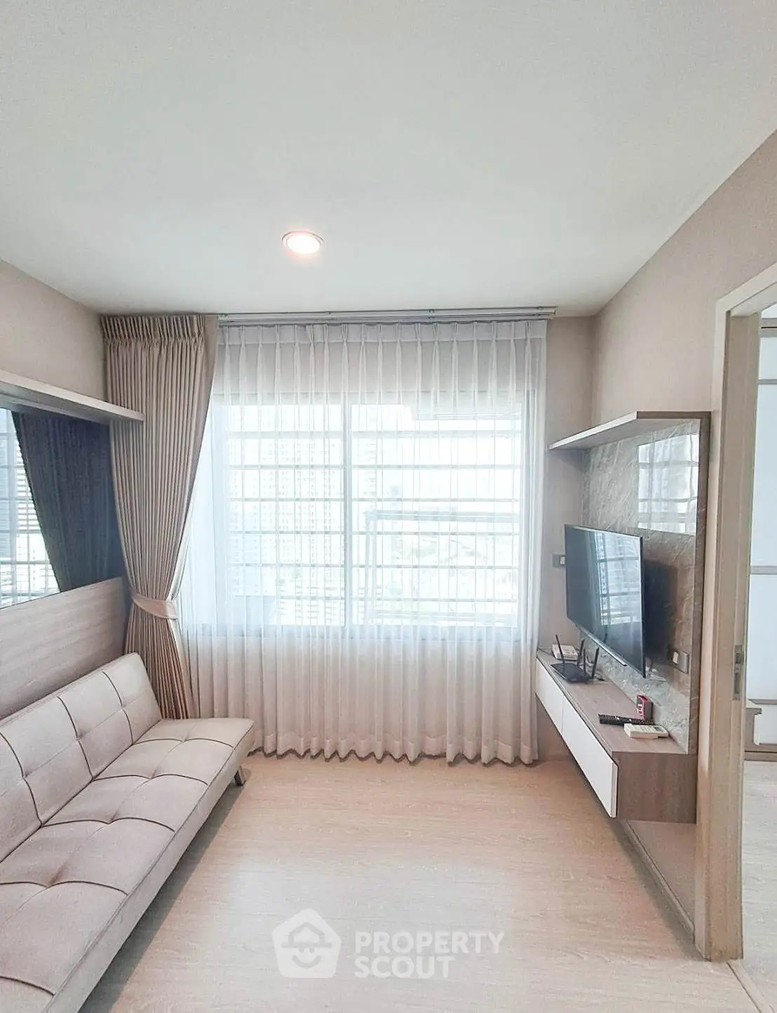 Modern living room with sleek design and natural light