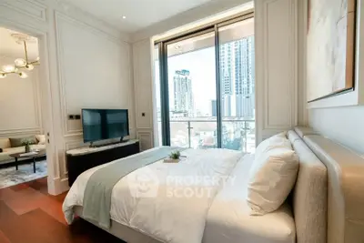 Luxurious bedroom with city view and elegant decor in modern apartment
