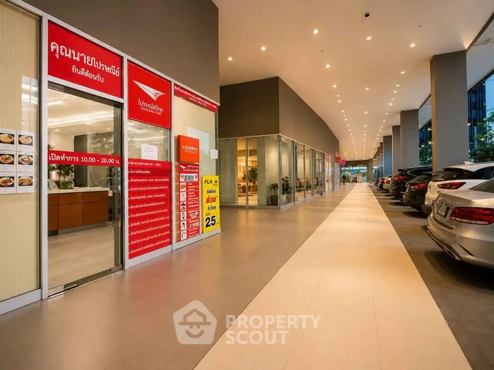 Modern commercial building with retail spaces and parking area, ideal for business opportunities.