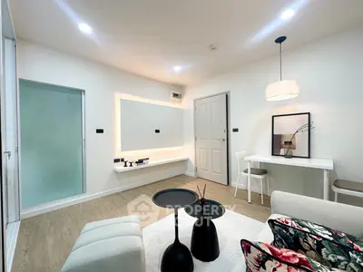 Modern living room with stylish decor and cozy seating area, perfect for relaxation and entertainment.