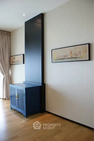 Elegant interior with modern decor and wooden flooring in a stylish living space.