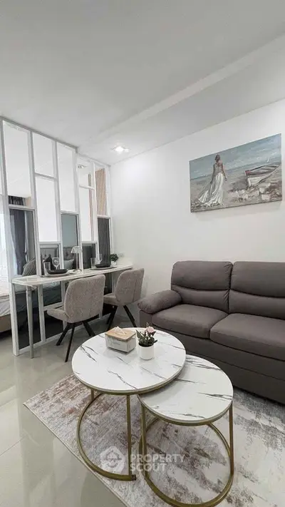 Modern living room with stylish furniture and elegant decor in a contemporary apartment.
