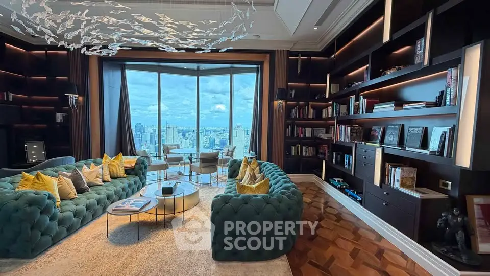 Luxurious living room with panoramic city view, elegant furniture, and built-in bookshelves.