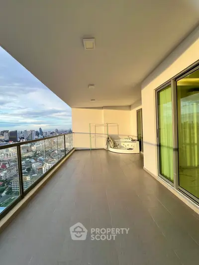 Spacious balcony with stunning city view and modern design.