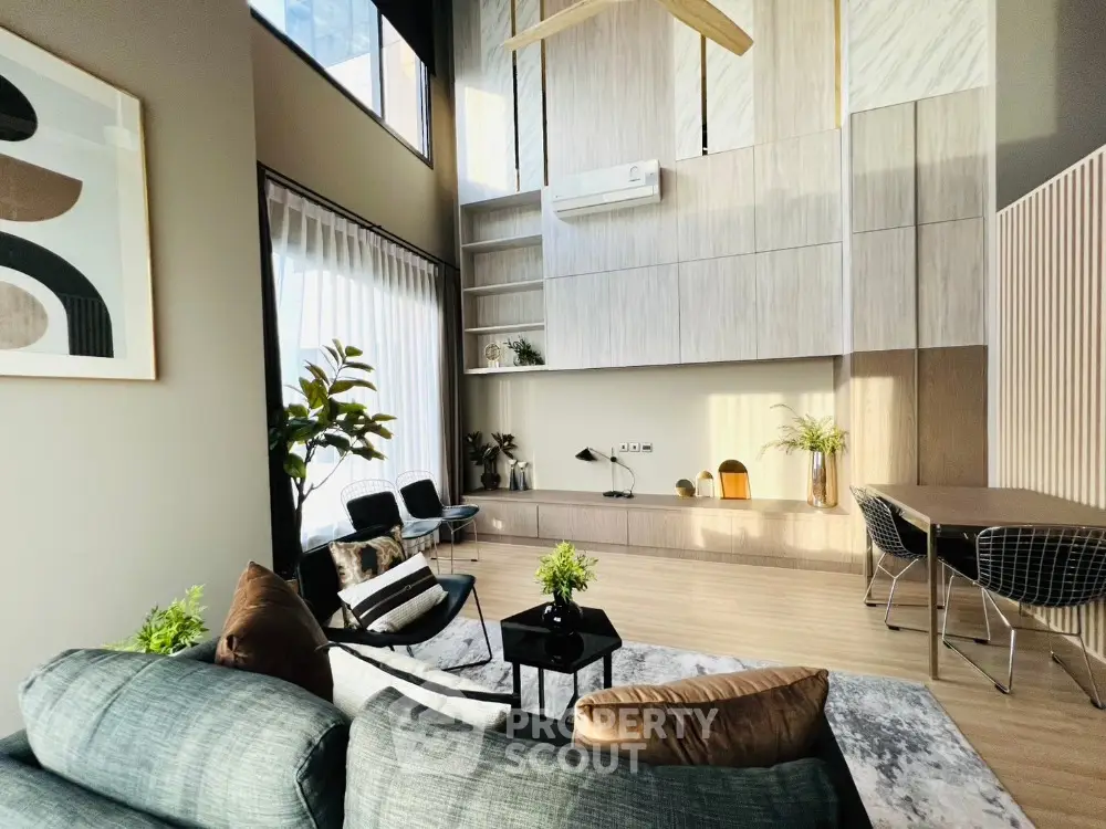 Spacious modern living room with high ceilings and stylish decor