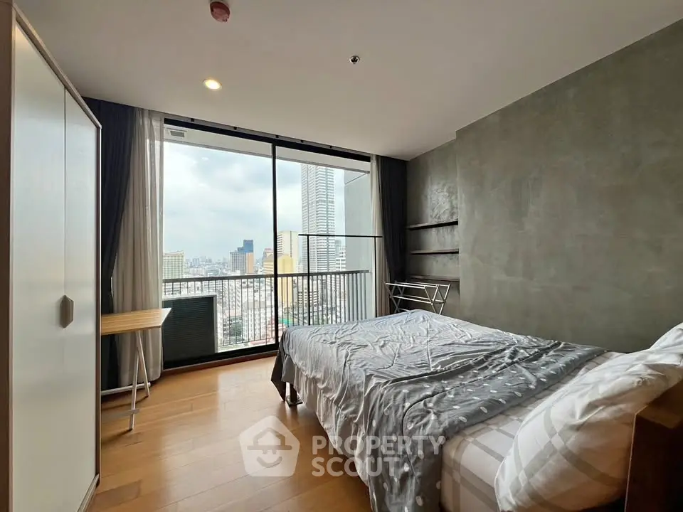 Modern bedroom with city view and minimalist decor