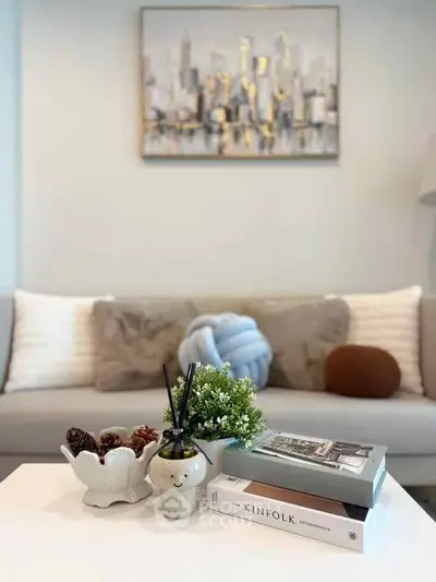 Stylish living room with cozy sofa and chic decor accents