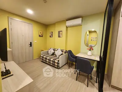 Modern living room with stylish decor and cozy seating area in a contemporary apartment.