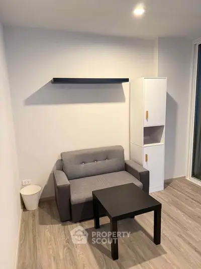 Modern living room with sleek furniture and stylish decor