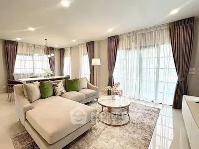Luxurious living room with elegant decor and ample natural light