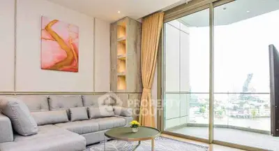 Modern living room with large windows and city view, featuring a stylish sofa and elegant decor.