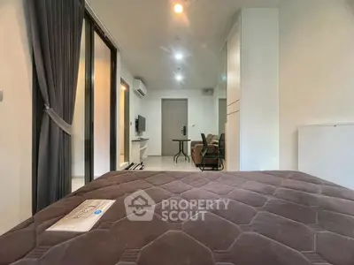 Modern studio apartment with open layout and stylish furnishings
