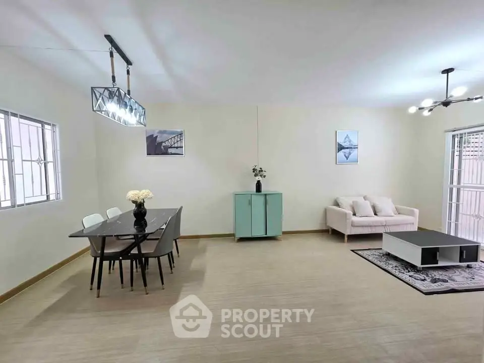 Spacious modern living room with dining area and stylish decor