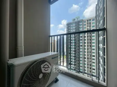 High-rise apartment balcony with city view and air conditioning unit