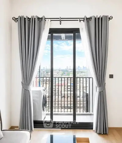 Modern apartment balcony with city view and elegant curtains