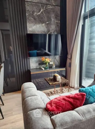 Modern living room with sleek TV setup and stylish decor