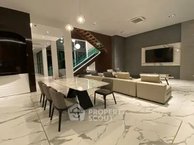 Luxurious modern living room with marble flooring and elegant dining area