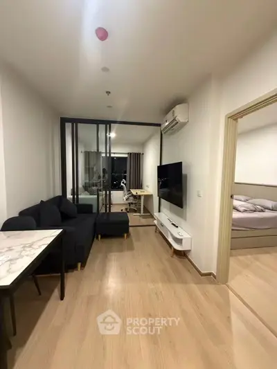 Modern apartment interior with cozy living room and stylish bedroom