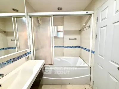 Spacious bathroom with modern bathtub and sleek design