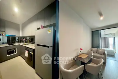 Modern kitchen and cozy dining area in stylish apartment