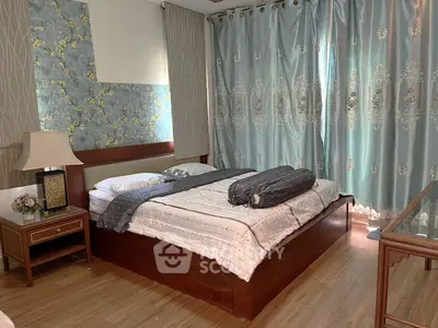 Elegant bedroom with luxurious curtains and stylish decor