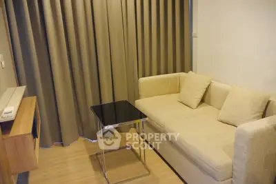 Cozy living room with beige sofa and modern decor