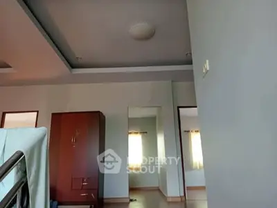 Spacious interior with modern wardrobe and natural light