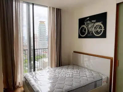 Modern bedroom with city view and stylish decor