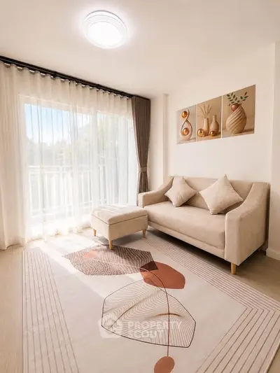 Bright living room with modern decor and large window for natural light