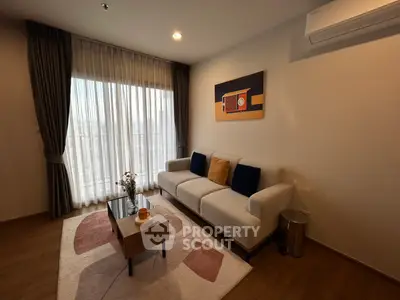 Modern living room with stylish decor and natural light