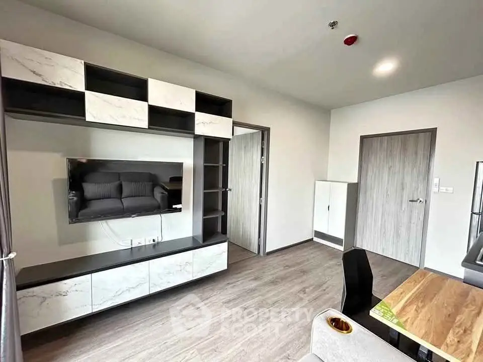 Modern living room with sleek built-in storage and stylish decor