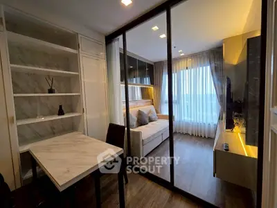 Modern living room with glass partition and elegant decor