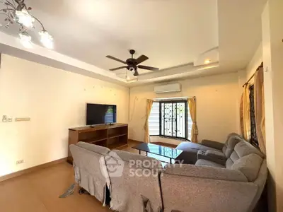 Spacious living room with modern decor and large sectional sofa
