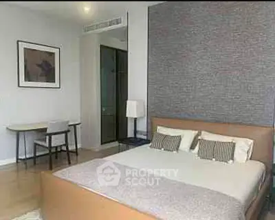 Modern bedroom with stylish decor and cozy atmosphere