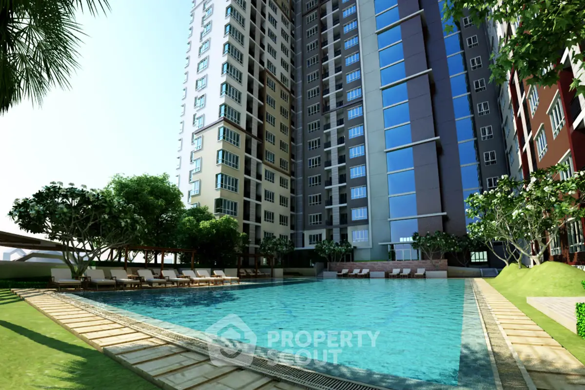 Luxurious apartment complex with stunning pool and lush greenery