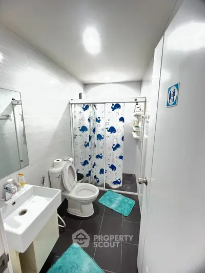 Modern bathroom with stylish decor and bright lighting