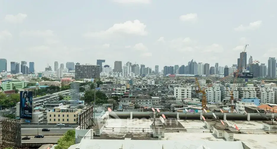 Stunning cityscape view showcasing urban skyline and residential buildings, perfect for real estate investment.