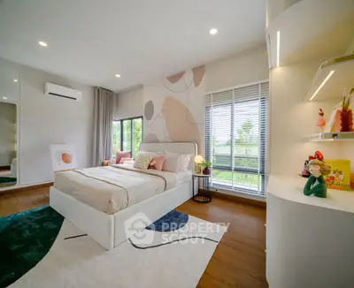 Modern bedroom with stylish decor, large windows, and wooden flooring, offering a cozy and inviting atmosphere.