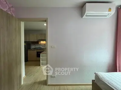 Modern apartment interior with air conditioning and open kitchen layout