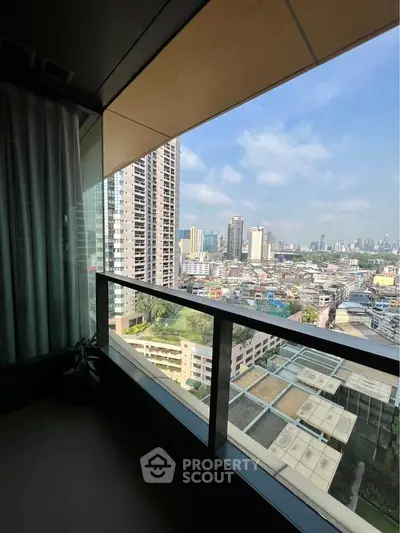 Stunning cityscape view from a modern high-rise balcony, perfect for urban living.