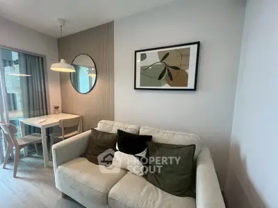 Modern living room with stylish decor and cozy seating area