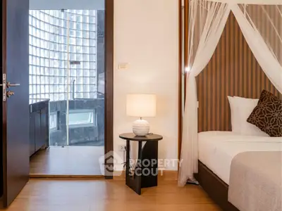 Luxurious bedroom with elegant decor and modern ensuite bathroom