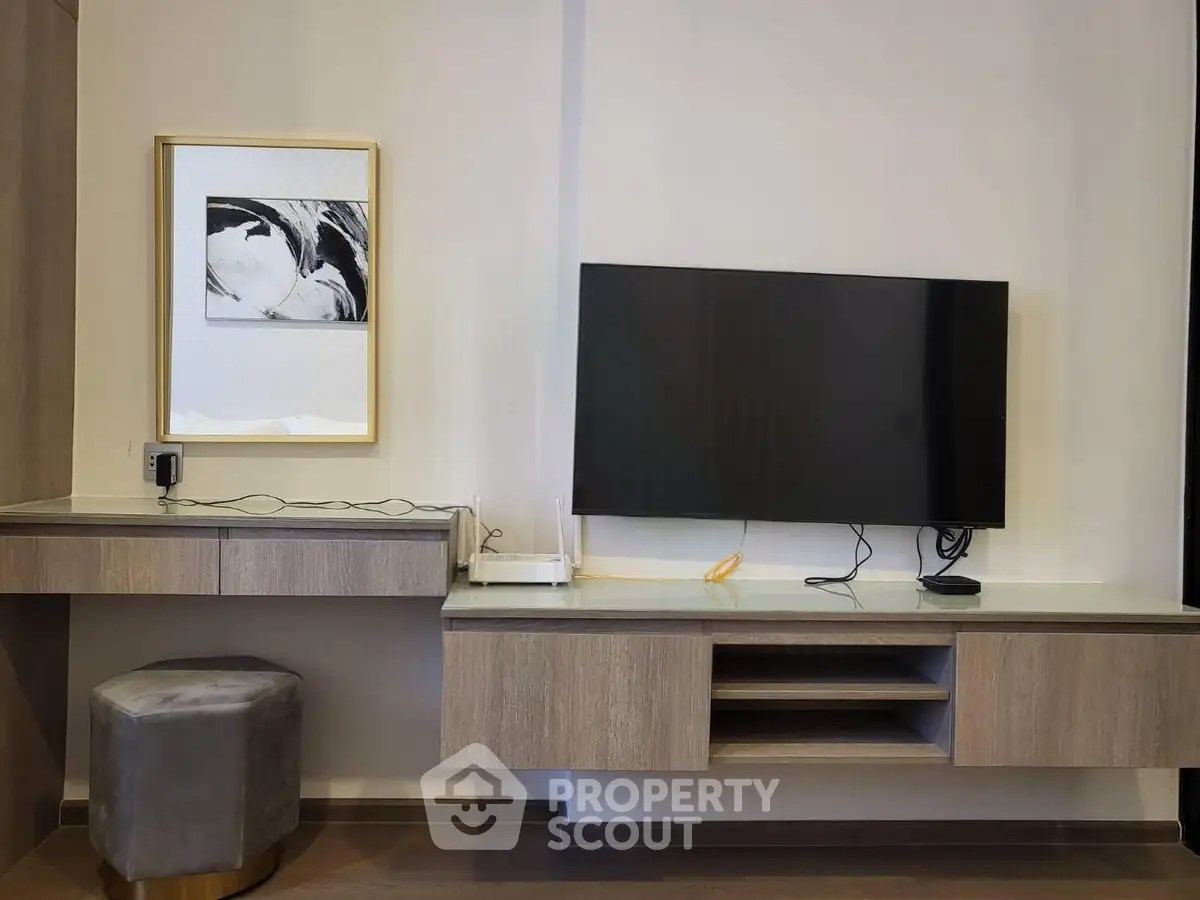 Modern living room with sleek TV unit and stylish decor