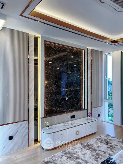 Luxurious modern living room with elegant marble accents and stylish lighting