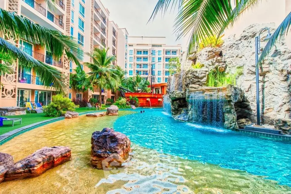 Luxurious tropical resort with stunning pool and waterfall feature