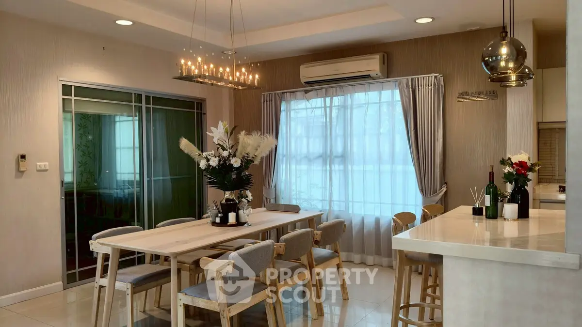 Elegant dining area with modern decor and natural light